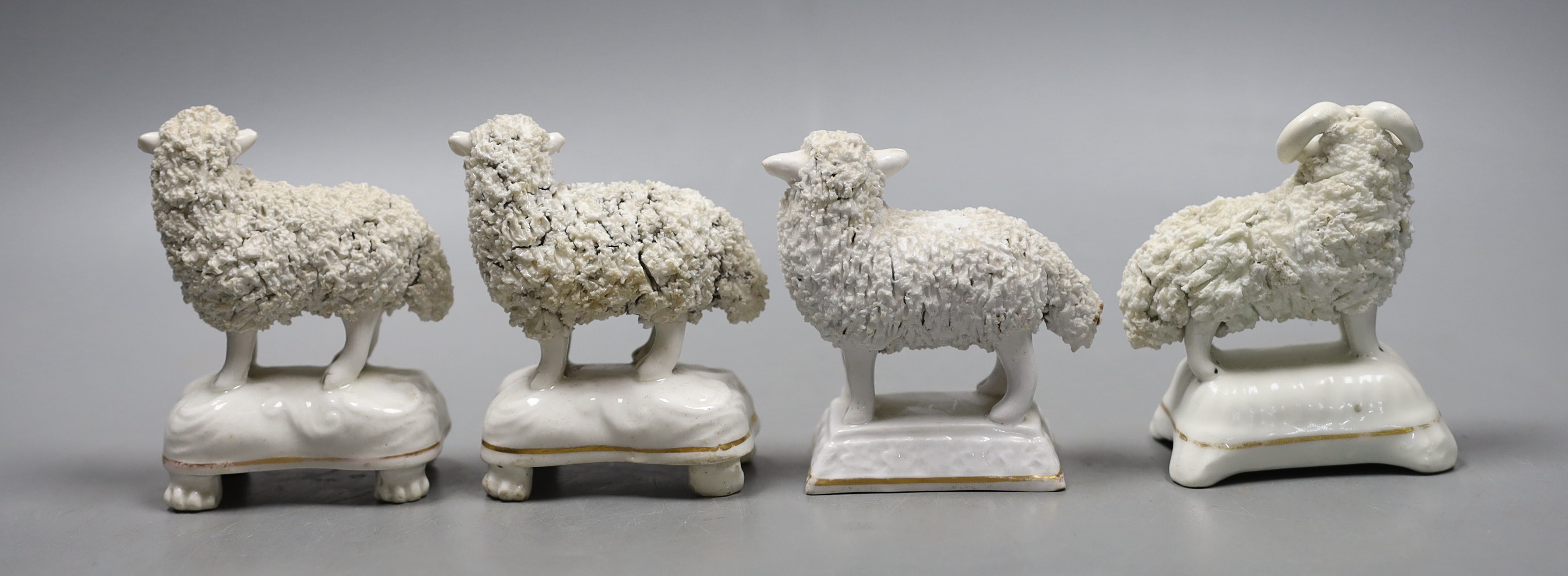 Four Staffordshire porcelain models of sheep, c.1830–50, the largest 7.5 cm long, Provenance- Dennis G Rice collection